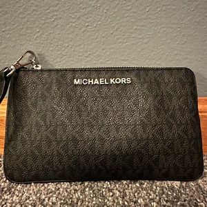 Jet Set Signature Logo Travel wristlet